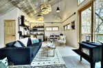 Livingroom offers tons of windows for natural light